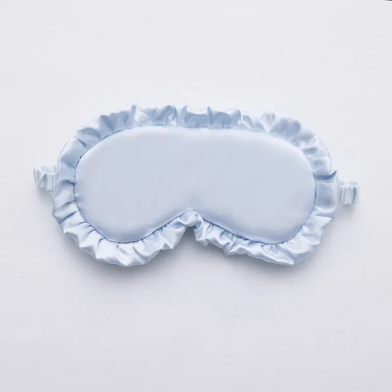 Masque de sommeil en soie à volants élégants